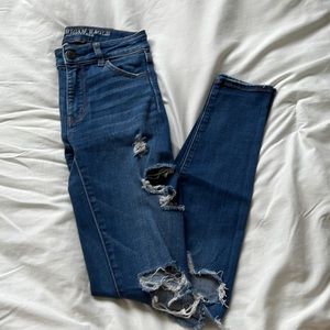 Blue American Eagle Skinny Jeans with rips, Size 00